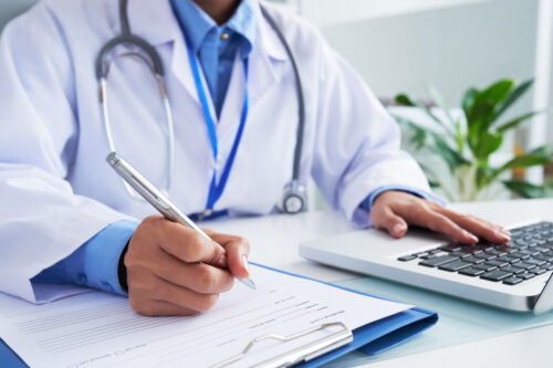 medical malpractice doctor writing