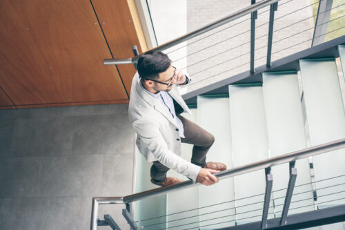 property premises liability accident injury man walking up stairs