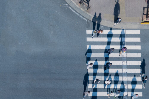 pedestrians walking on crosswalk